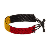A beaded ArtiKen bracelet, handmade in Kenya, in Belgium colors, black, yellow, red.