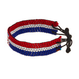 A beaded ArtiKen bracelet, handmade in Kenya, in Croatia flag colors, red, white, blue.