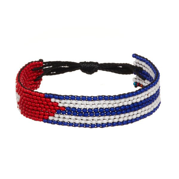 A beaded ArtiKen bracelet, handmade in Kenya, in Cuban flag colors, red, white, blue.