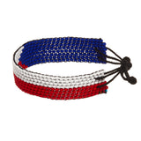 A beaded ArtiKen bracelet, handmade in Kenya, in Czech Republic flag colors, blue, white, red.
