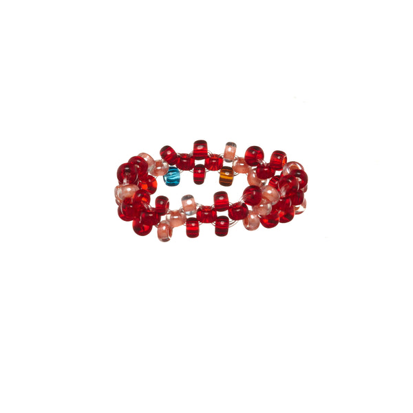 A beaded ArtiKen ring, handmade in Kenya, in red and clear beads.