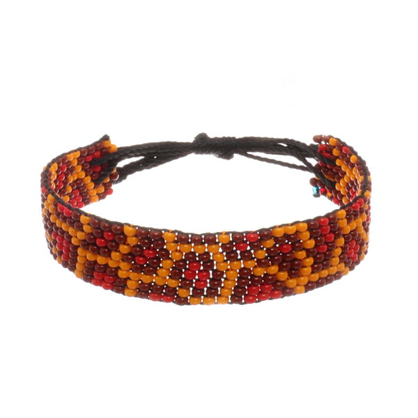 A handmade in Kenya, ArtiKen bracelet displays the pattern of a Giraffe.